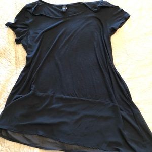 Asymmetrical black tunic.